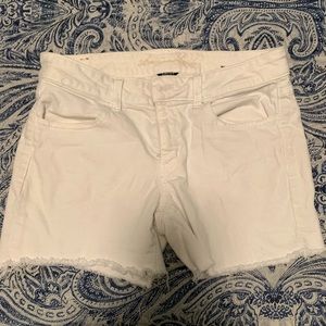 AE White stretch jegging cut off shorts